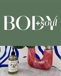 Body and Soul logo above a pink vase and a Koala Eco bottle.