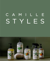 Koala Eco products on a green background.