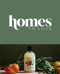 Koala Eco citrus hand wash with oranges and green leaves.