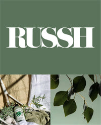 RUSSH cover with green leaves and white sneakers.