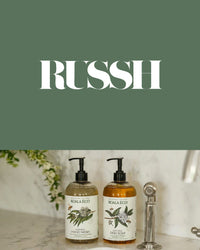 RUSSH logo above two Koala Eco pump bottles on a marble counter.