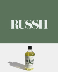 Koala Eco green and white bottle with botanical label.